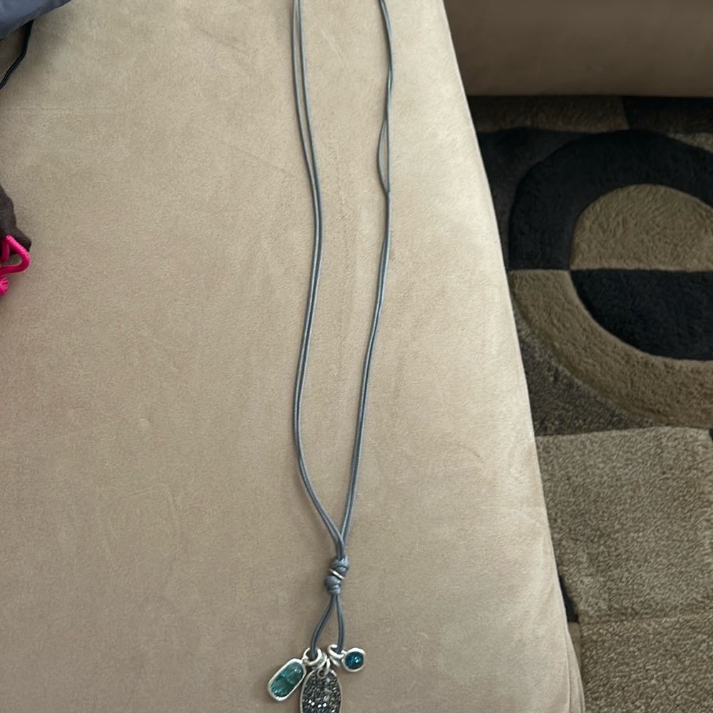 Cord necklace adjustable with hanging stones